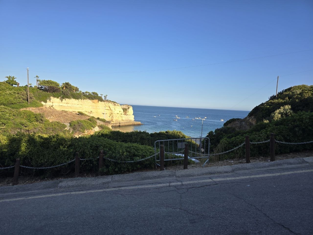 Road and viewpoint above Praia de Nossa Senhora da Rocha after leaving the beach