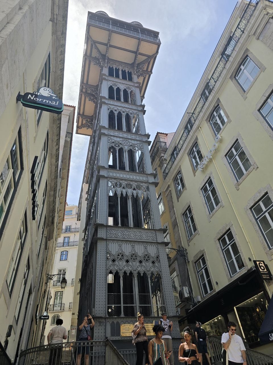 Elevador de Santa Justa iron lift rising between buildings in Baixa Lisbon