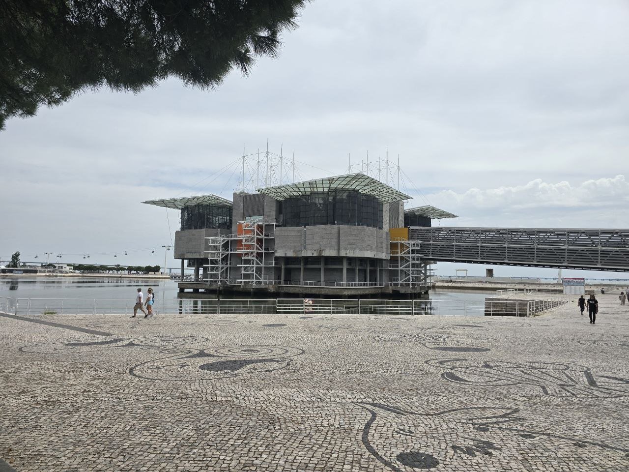Exterior view of the Oceanário de Lisboa building on the waterfront