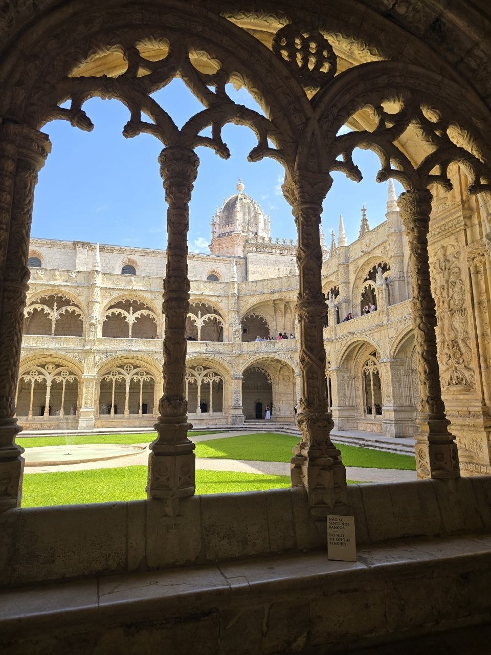 Jerónimos arches framing the courtyard
