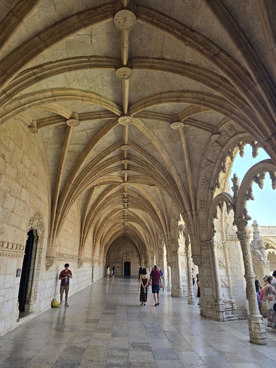 Vaulted cloister corridor inside Jerónimos Monastery