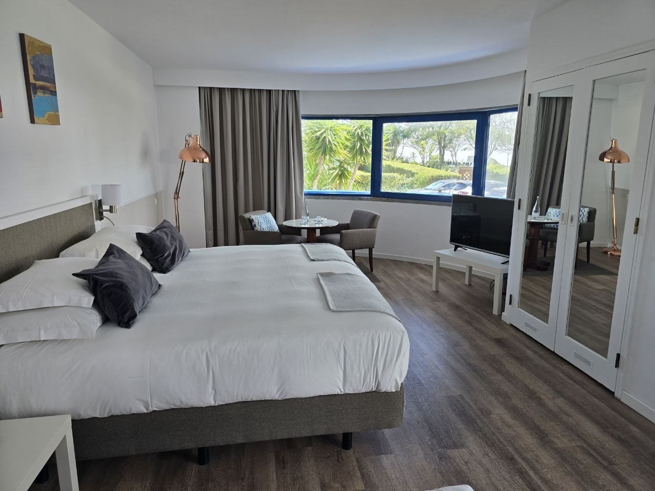 Bright room at Pestana Cascais with beds and a window
