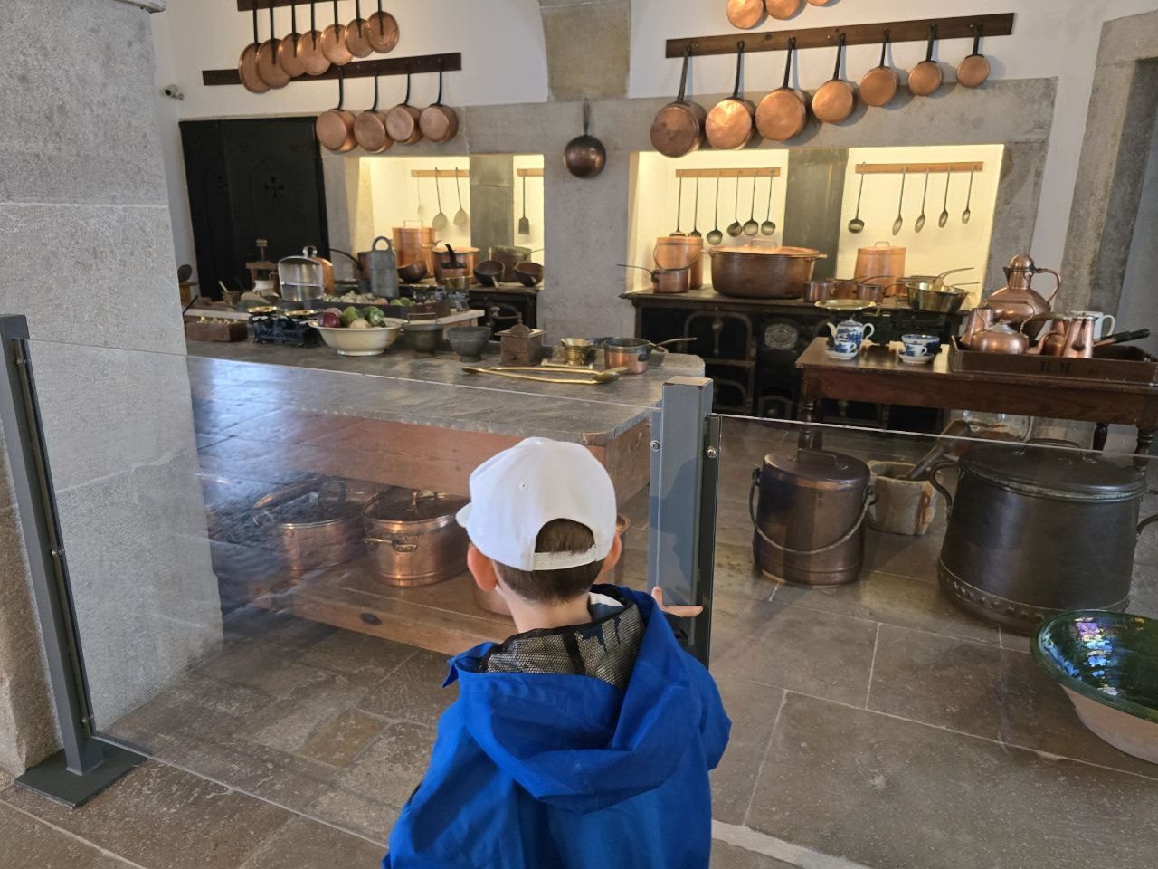 Noah walking toward a palace cafe or service counter