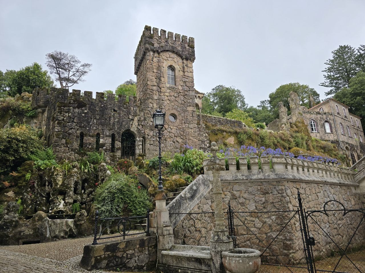 Stone tower and walls in the gardens of Quinta da Regaleira