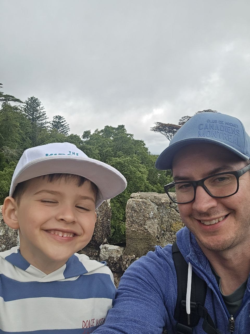 Dad and Noah smiling for a selfie outdoors in Sintra