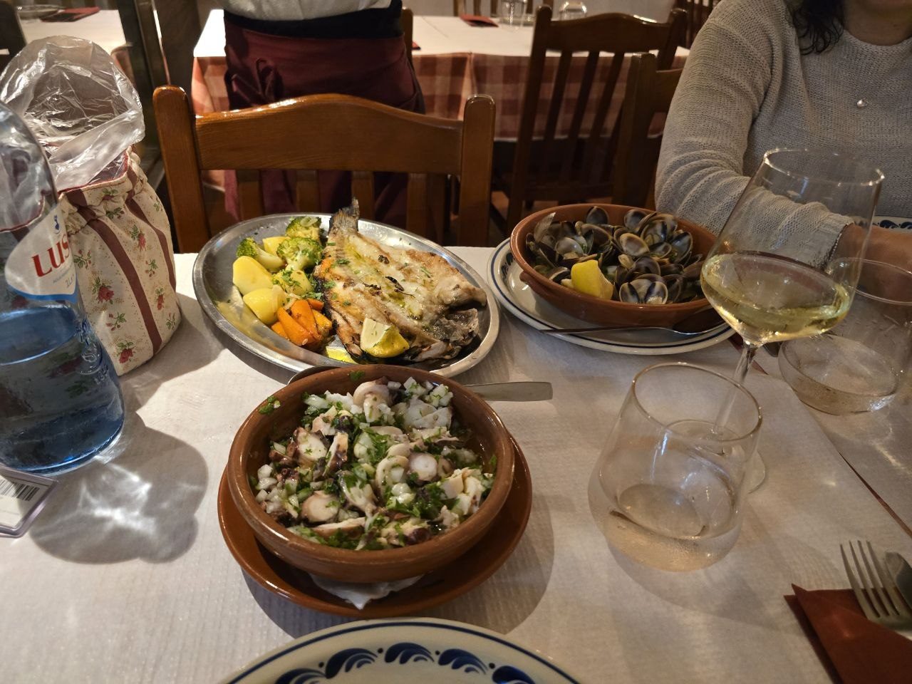 Portuguese dinner dishes on a restaurant table