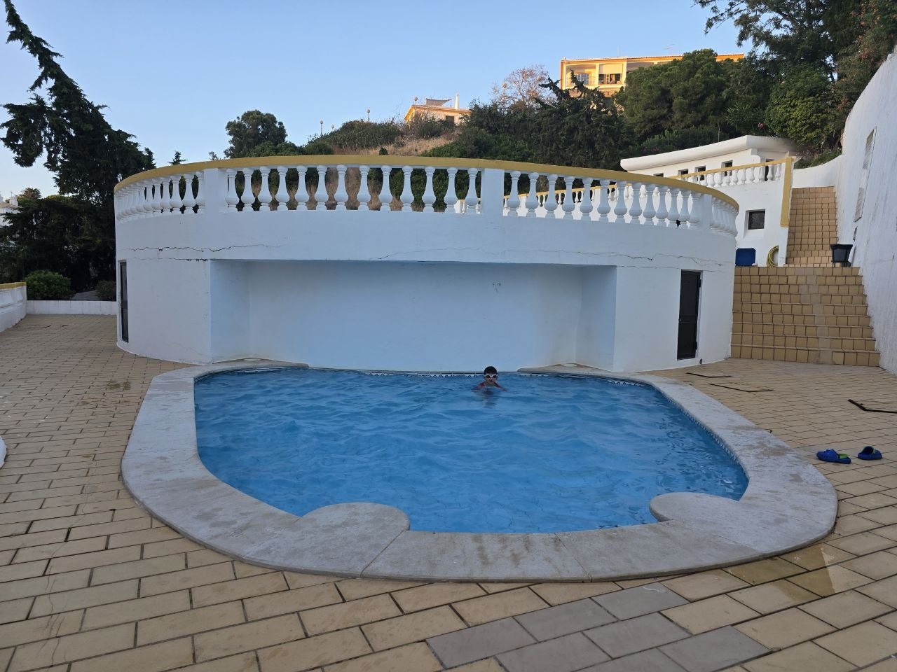 Noah swimming in the Carvoeiro condo pool