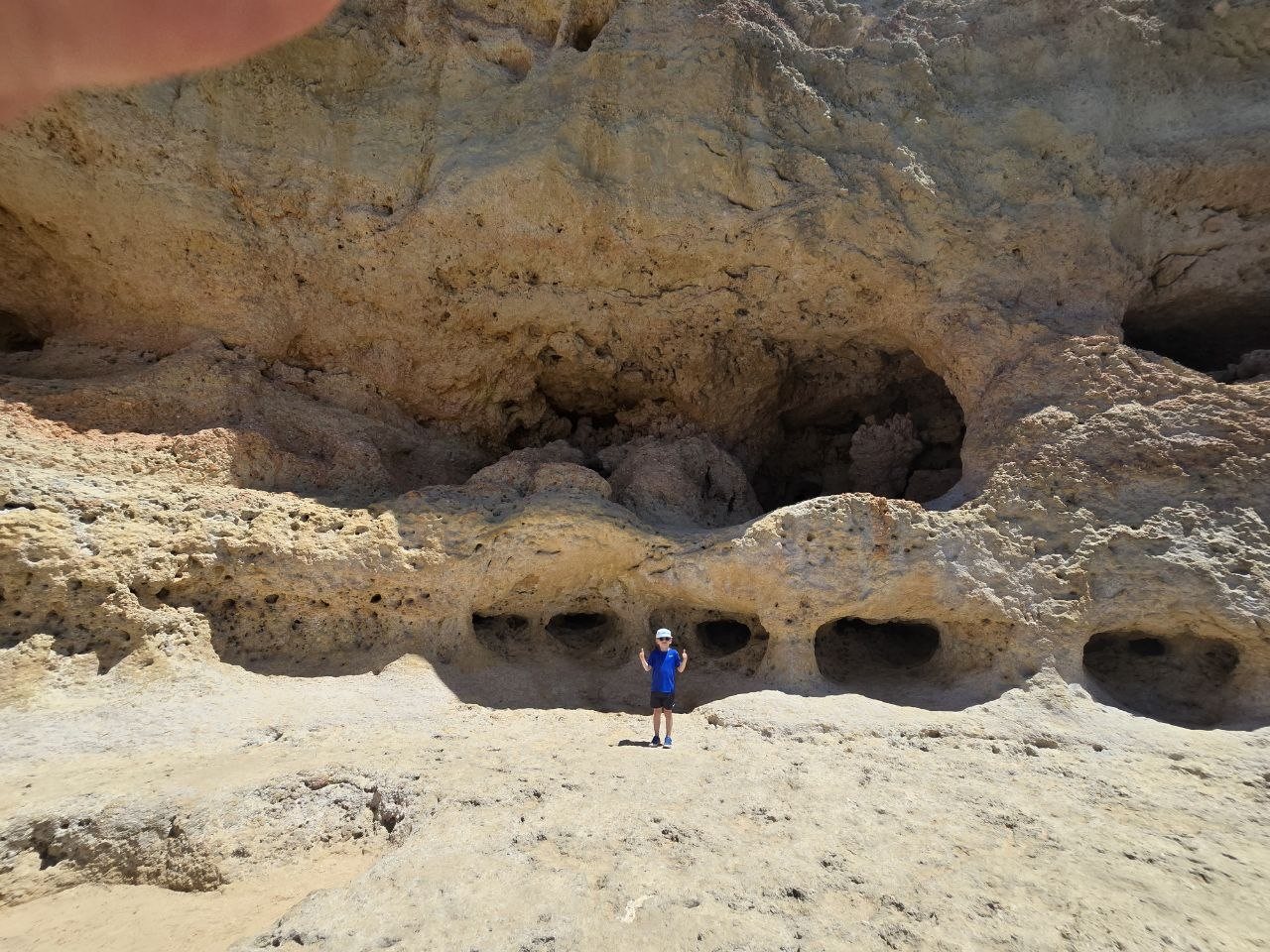 Honeycomb-like holes in pale limestone at Algar Seco