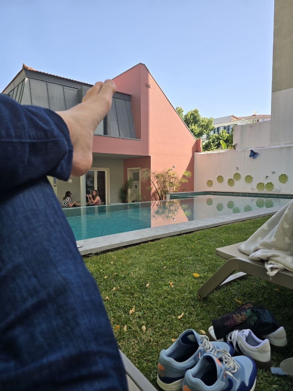Poolside lounge chair view at the Lisbon hotel while waiting for the room